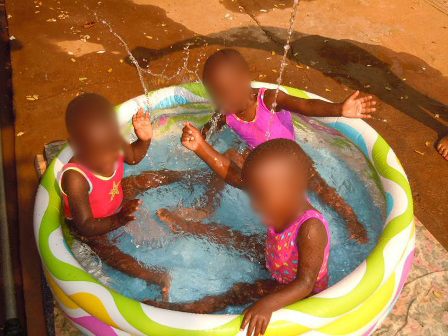 Toddlers in Paddling Pool